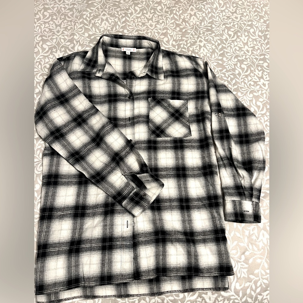 Black and white flannel. Size L. Fits TTS.